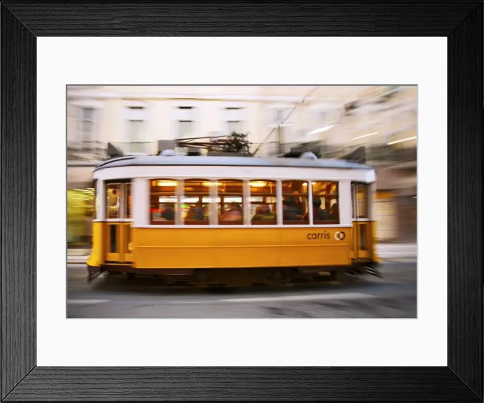 Framed Print : Europe, Portugal, Lisbon, a speeding tram (streetcar) in the city center Framed Print : Europe, Portugal, Lisbon, a speeding tram (streetcar) in the city center