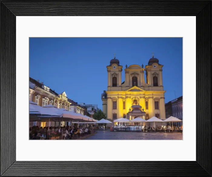 Framed Print : Roman Catholic Cathedral and outdoor cafes in Piata Unirii, Timisoara, Banat, Romania Framed Print : Roman Catholic Cathedral and outdoor cafes in Piata Unirii, Timisoara, Banat, Romania