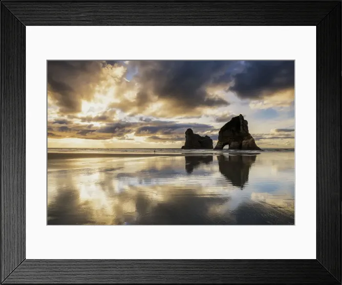 Framed Print : Lone Person on Wharariki Beach at Sunset, New Zealand Framed Print : Lone Person on Wharariki Beach at Sunset, New Zealand