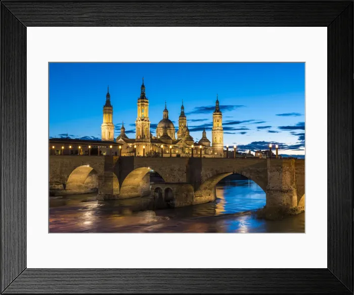 Framed Print : Cathedral of Our Lady of the Pillar and stone bridge at dusk. Zaragoza, Aragon, Spain Framed Print : Cathedral of Our Lady of the Pillar and stone bridge at dusk. Zaragoza, Aragon, Spain