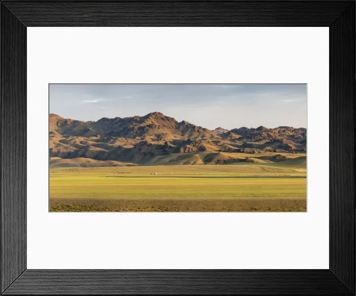 Framed Print : Nomadic camp with livestock and mountains in the background. Bayandalai district Framed Print : Nomadic camp with livestock and mountains in the background. Bayandalai district