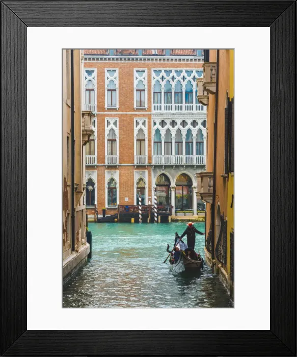 Framed Print : Waterfront palaces and tourists on gondola in a narrow canal tributary of the Grand Canal Framed Print : Waterfront palaces and tourists on gondola in a narrow canal tributary of the Grand Canal