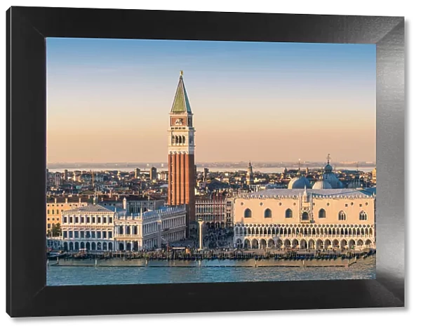 Venice, Veneto, Italy. St Marks Square and Doges palace at sunset. High angle view