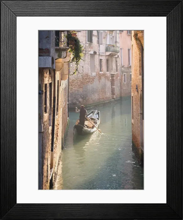 Framed Print : Gondola and gondolier in a small venetian canal, Venice, Veneto, Italy Framed Print : Gondola and gondolier in a small venetian canal, Venice, Veneto, Italy