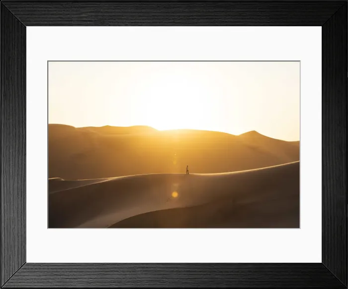 Framed Print : Walvis Bay, Namibia, Africa. Man walking on the sand dunes at sunset Framed Print : Walvis Bay, Namibia, Africa. Man walking on the sand dunes at sunset