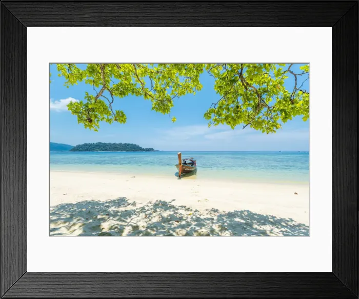 Framed Print : Ko Lipe, Satun Province, Thailand. Traditional long tail boat moored on an empty beach Framed Print : Ko Lipe, Satun Province, Thailand. Traditional long tail boat moored on an empty beach
