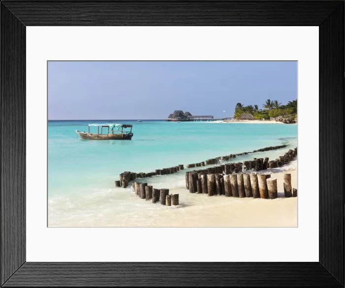 Framed Print : A breakwater and boat, Kendwa Beach, Zanzibar, Tanzania Framed Print : A breakwater and boat, Kendwa Beach, Zanzibar, Tanzania