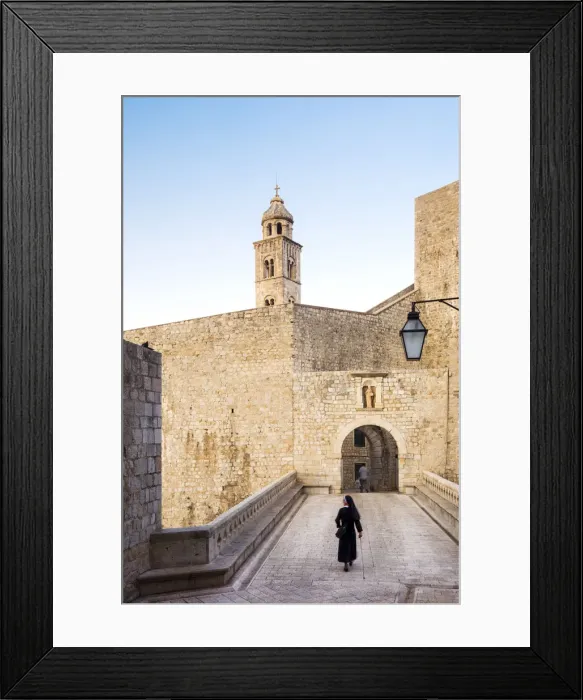 Framed Print : Croatia, Dubrovnik, Nun walking through the old town Framed Print : Croatia, Dubrovnik, Nun walking through the old town