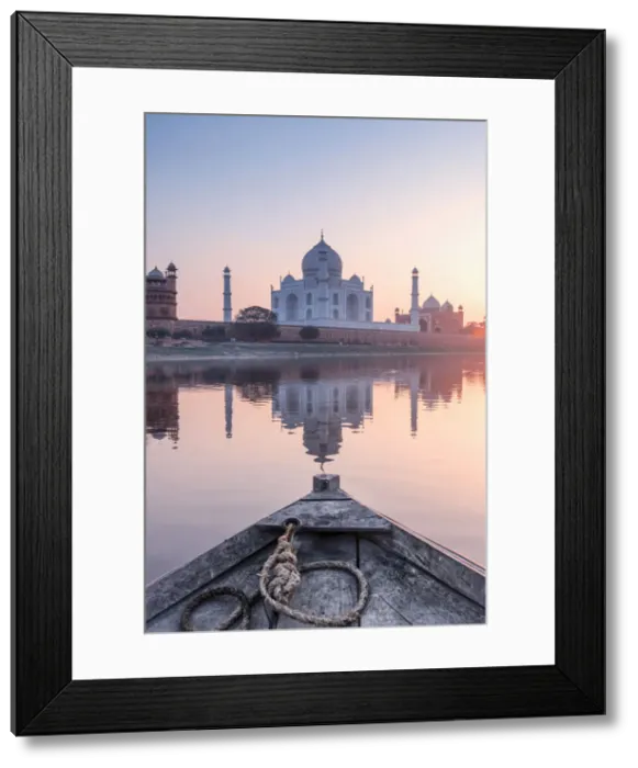 Framed Print : India, view of the Taj Mahal reflecting in the Yamuna river at sunset from a wooden boat Framed Print : India, view of the Taj Mahal reflecting in the Yamuna river at sunset from a wooden boat