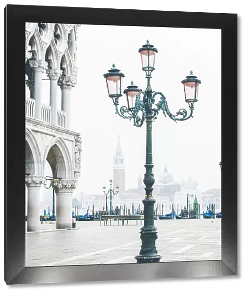 Venice, Veneto, Italy. Piazzetta San Marco and the waterfront on a misty morning