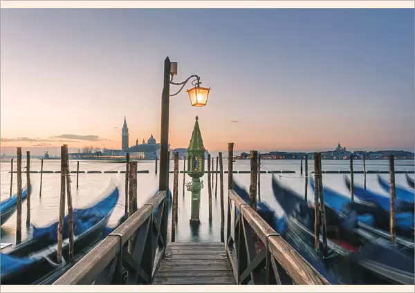 Venice, Veneto, Italy. Waterfront in Riva degli Schiavoni at sunrise