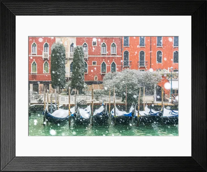 Framed Print : Venice, Veneto, Italy. Snowfall over moored gondolas along the Grand Canal (Canal Grande) Framed Print : Venice, Veneto, Italy. Snowfall over moored gondolas along the Grand Canal (Canal Grande)