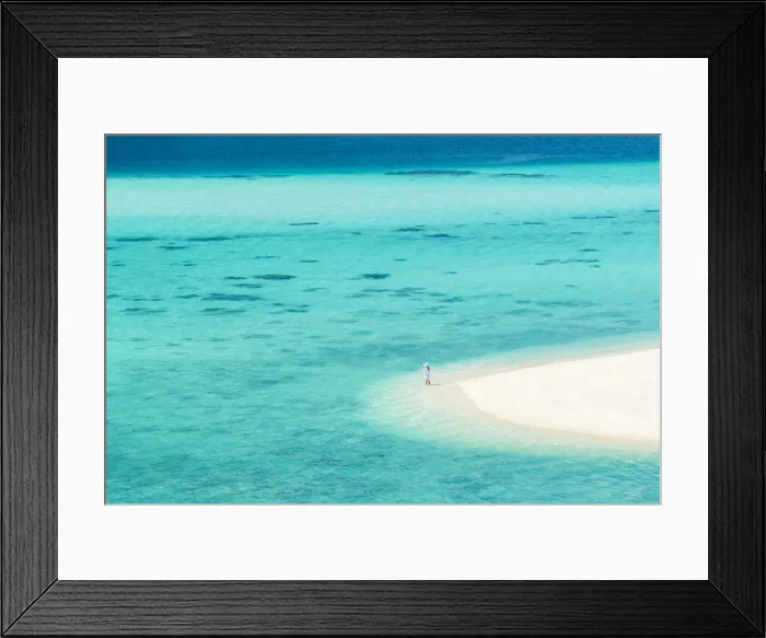 Framed Print : Ko Lipe, Satun Province, Thailand. Tourist admring the turquoise water from a white beach strand Framed Print : Ko Lipe, Satun Province, Thailand. Tourist admring the turquoise water from a white beach strand