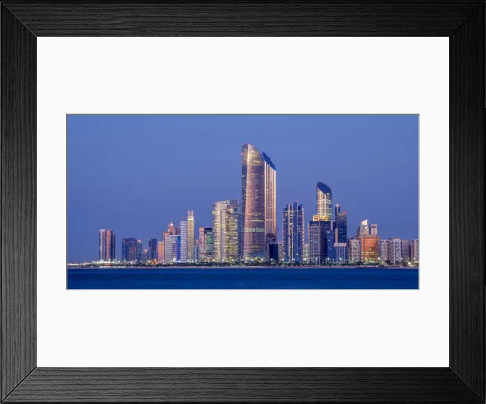 Framed Print : Skyline of the city center at twilight, Abu Dhabi, United Arab Emirates Framed Print : Skyline of the city center at twilight, Abu Dhabi, United Arab Emirates