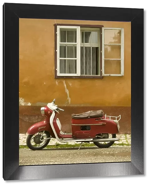 Red moped, Sighisoara, Transylvania, Romania