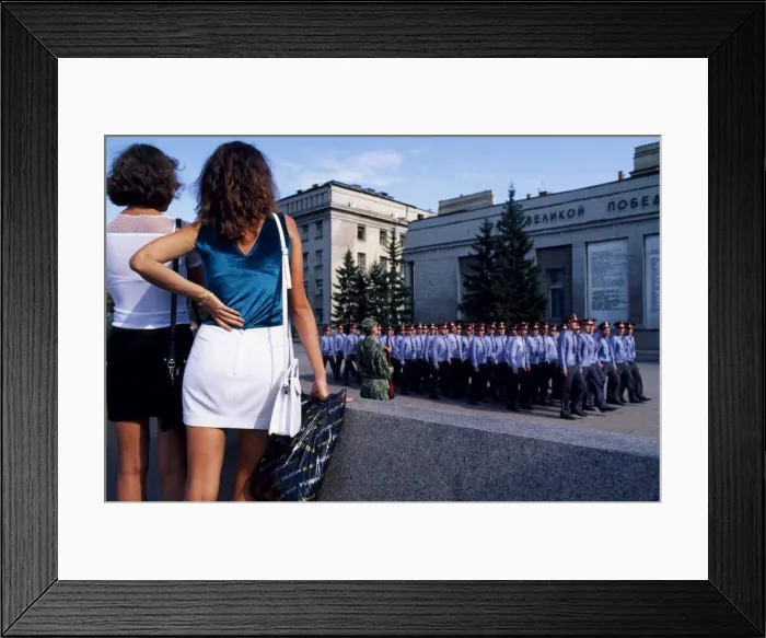 Framed Print : Girls watching a military parade in the main square Framed Print : Girls watching a military parade in the main square