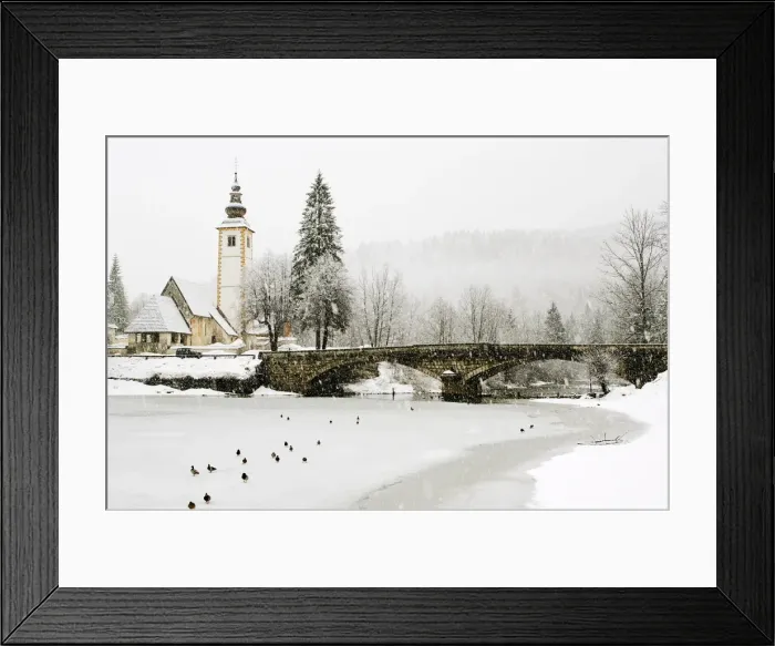 Framed Print : Winter scene in village in Slovenia Framed Print : Winter scene in village in Slovenia