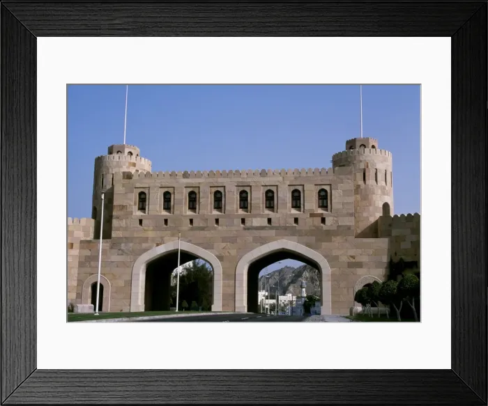Framed Print : The Mathaib Gate spans the main road into Framed Print : The Mathaib Gate spans the main road into