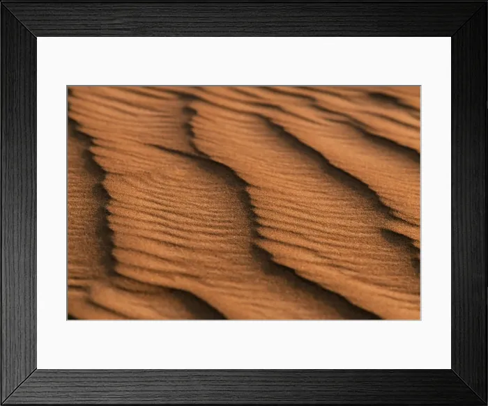 Framed Print : Low light and shadows highlight ridges made by the wind in the sand dunes Framed Print : Low light and shadows highlight ridges made by the wind in the sand dunes