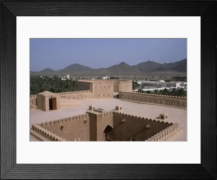 Framed Print : The interior courtyard and a watchtower within Al Hazm Castle Framed Print : The interior courtyard and a watchtower within Al Hazm Castle