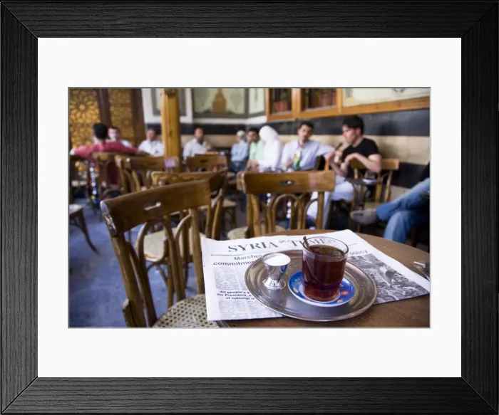 Framed Print : Drinking tea in the famous Al Nawfara cafe in Old Damascus