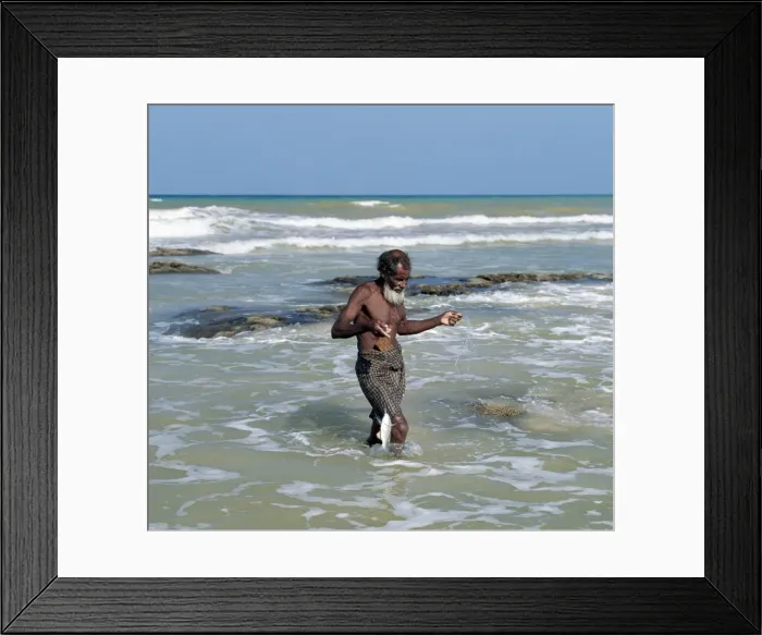 Framed Print : An old fisherman brings in his catch at Apallhen Beach Framed Print : An old fisherman brings in his catch at Apallhen Beach