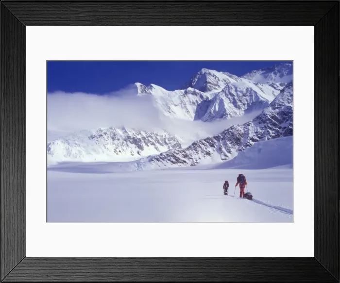 Framed Print : Climbers ski up the Kahiltna Glacier towards Mount McKinley