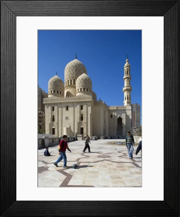 Framed Print : Childern play football in front of the Abu Al-Abbas Al-Mursi Mosque Framed Print : Childern play football in front of the Abu Al-Abbas Al-Mursi Mosque