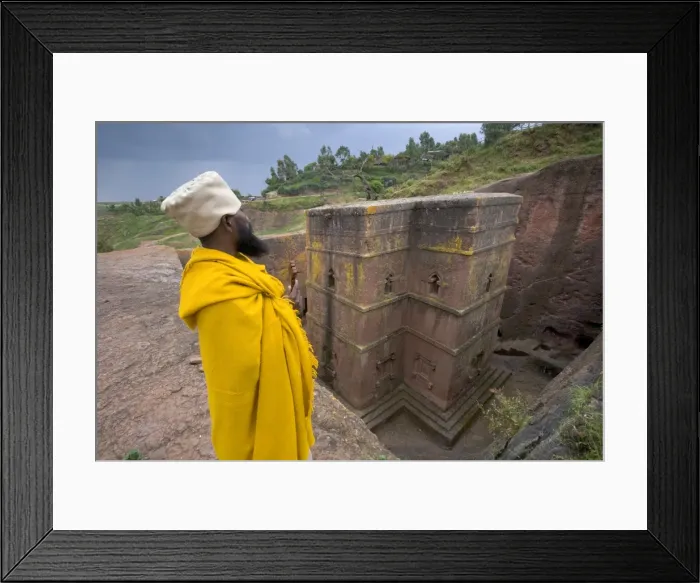 Framed Print : Priest outside the Sunken Rock Hewn church of Bet Giyorgis Framed Print : Priest outside the Sunken Rock Hewn church of Bet Giyorgis