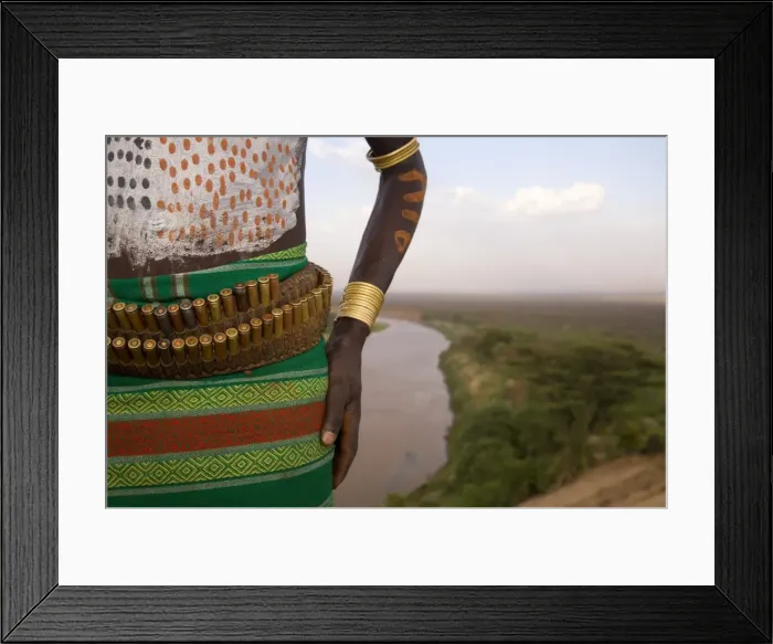 Framed Print : Karo Tribesman wearing a belt of bullets, Lower Omo Valley, Ethiopia Framed Print : Karo Tribesman wearing a belt of bullets, Lower Omo Valley, Ethiopia