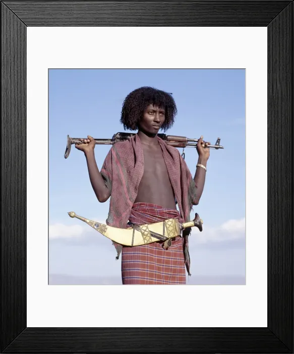Framed Print : Warriors of the nomadic Afar tribe wear their hair Framed Print : Warriors of the nomadic Afar tribe wear their hair