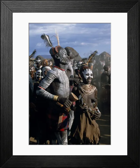 Framed Print : Men and women dance together in the Karo village of Duss Framed Print : Men and women dance together in the Karo village of Duss