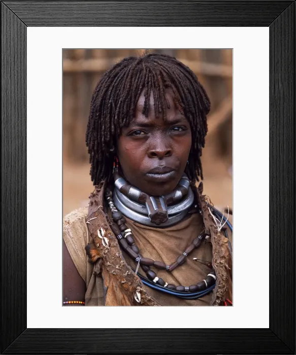 Framed Print : A Hamar woman in the village square of Dimeka