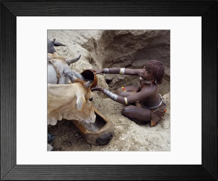 Framed Print : Assisted by her husband Framed Print : Assisted by her husband