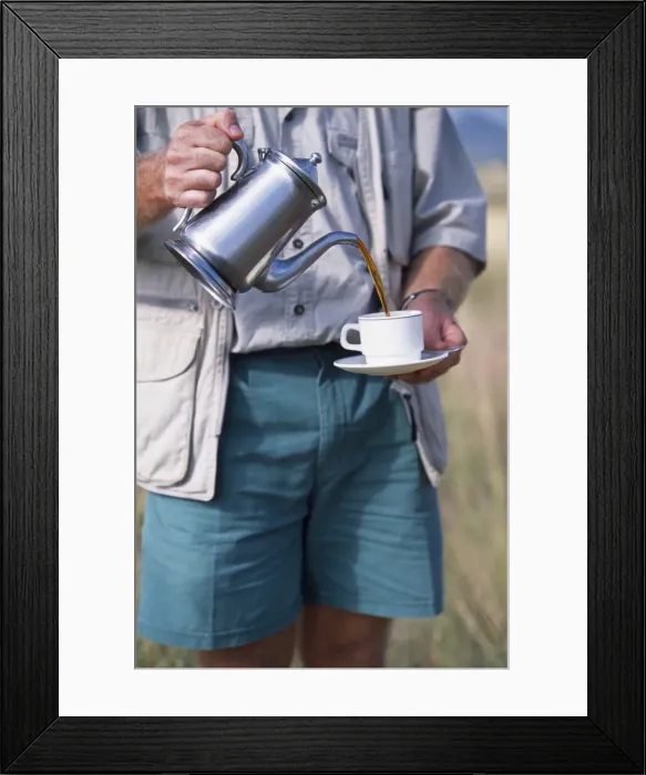 Framed Print : Safari guide pours coffee, Elsas Kopje Framed Print : Safari guide pours coffee, Elsas Kopje