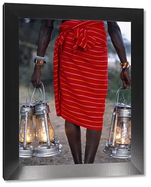 Service in the bush - kerosene lanterns light the pathway