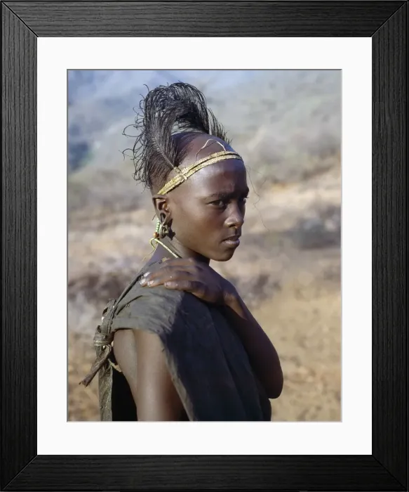 Framed Print : A Samburu boy in reflective mood after his circumcision Framed Print : A Samburu boy in reflective mood after his circumcision