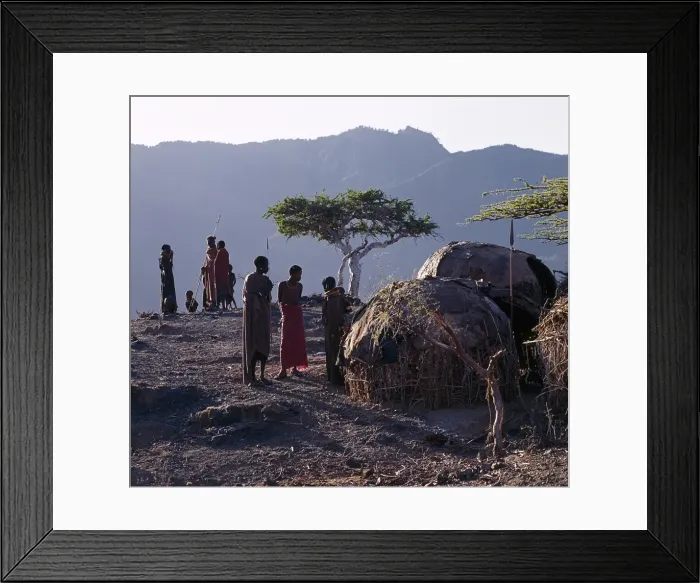 Framed Print : As the sun rises above the forested peaks of Mount Nyiru Framed Print : As the sun rises above the forested peaks of Mount Nyiru