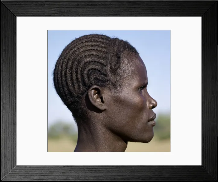 Framed Print : A young Turkana man with a braided hairstyle Framed Print : A young Turkana man with a braided hairstyle