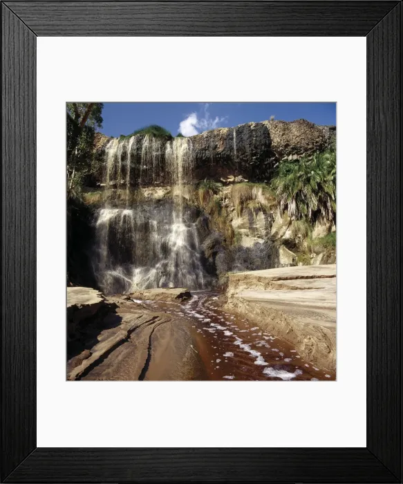 Framed Print : A waterfall with brackish water flows from a swamp Framed Print : A waterfall with brackish water flows from a swamp