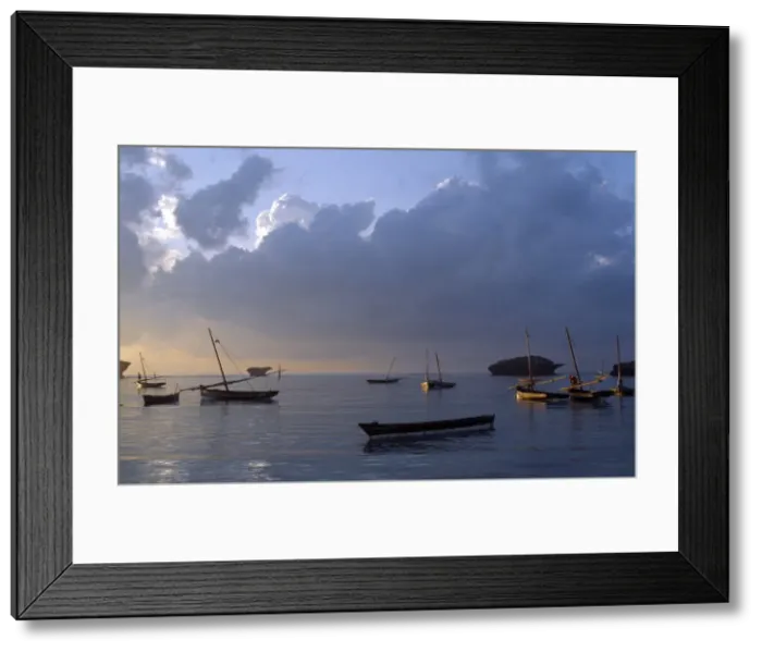 Framed Print : Fishermen set out at daybreak in their traditional wooden craft Framed Print : Fishermen set out at daybreak in their traditional wooden craft