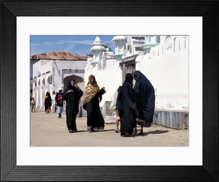 Framed Print : A group of Swahili women clad in black to signify their Framed Print : A group of Swahili women clad in black to signify their