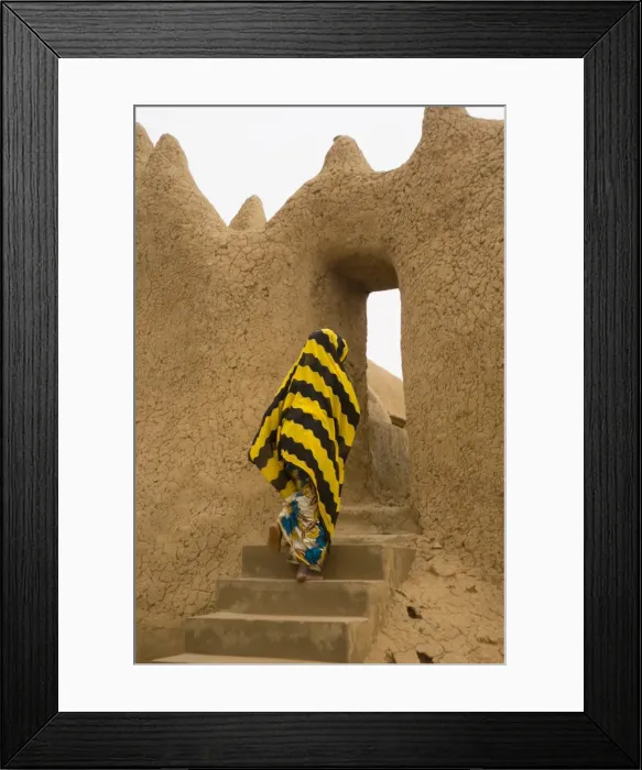 Framed Print : Woman outside Mud Mosque in Segoukoro, Segou, Mali Framed Print : Woman outside Mud Mosque in Segoukoro, Segou, Mali
