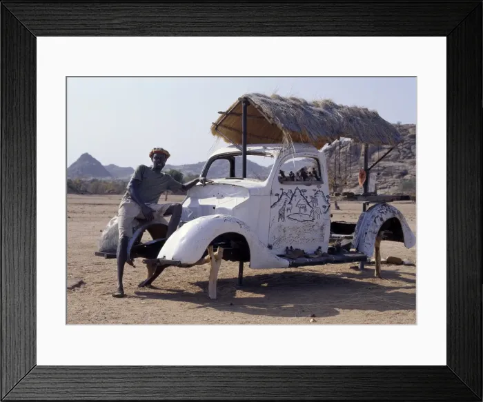 Framed Print : An innovative roadside craft stall owned by an Herero man near Twyfelfontein Framed Print : An innovative roadside craft stall owned by an Herero man near Twyfelfontein