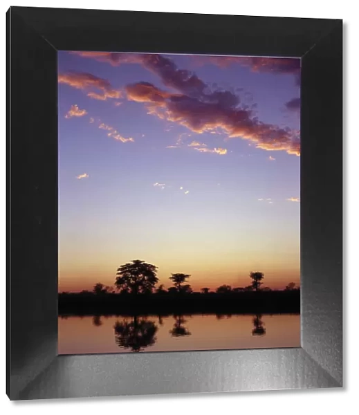 The last rays of the setting sun over the Okavango River at Rundu