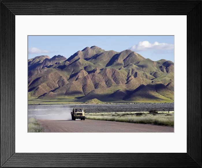 Framed Print : A truck passing through the Naukluft Mountains near Solitaire Framed Print : A truck passing through the Naukluft Mountains near Solitaire