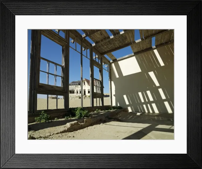 Framed Print : A scene in the deserted diamond-mining town of Kolmanskop Framed Print : A scene in the deserted diamond-mining town of Kolmanskop