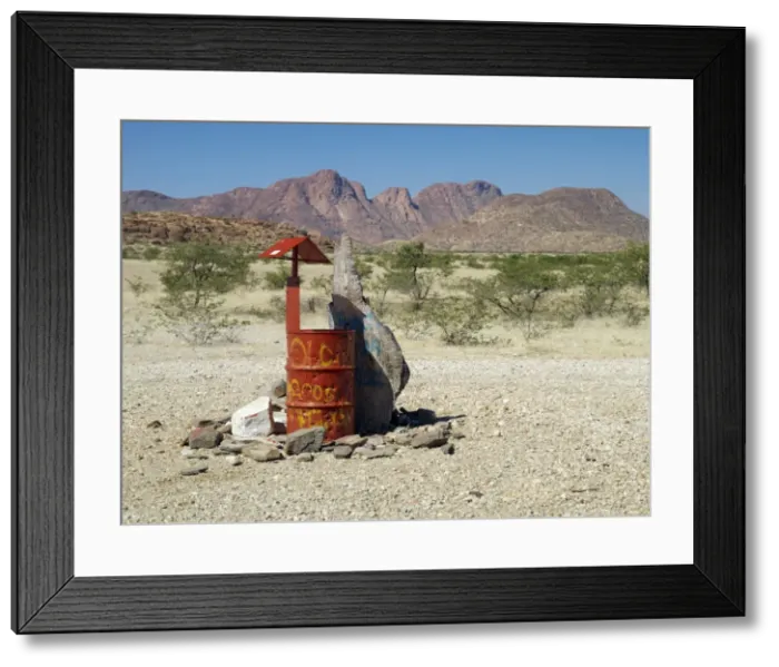 Framed Print : Rooi Drom features on most Namibian maps and a visitor Framed Print : Rooi Drom features on most Namibian maps and a visitor