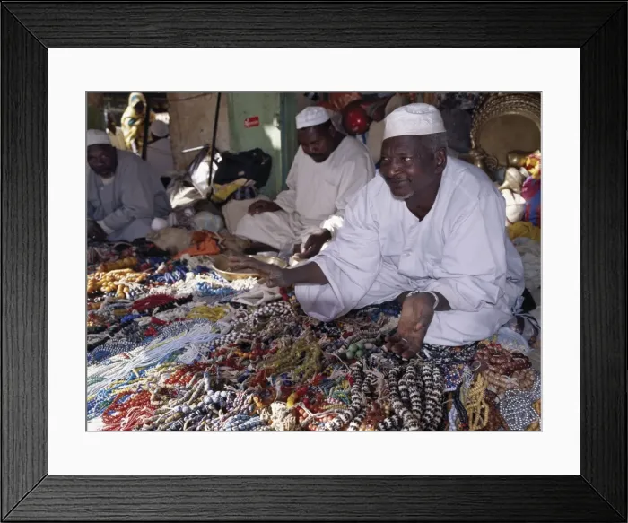 Framed Print : Traders offer a large variety of beads for sale in Framed Print : Traders offer a large variety of beads for sale in