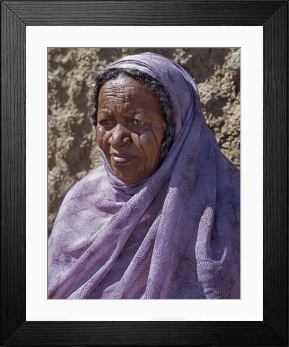 Framed Print : Nubian women wear bright dresses and headscarves even Framed Print : Nubian women wear bright dresses and headscarves even